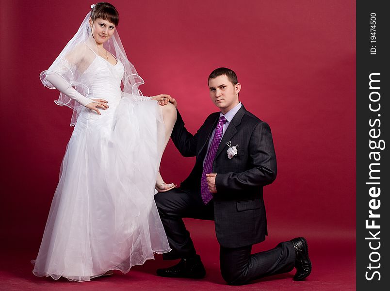 Couple Newlyweds In Wedding Dress And Suit