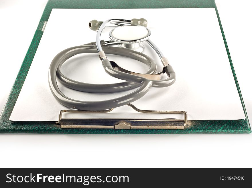 Stethoscope and clipboard isolated on white background