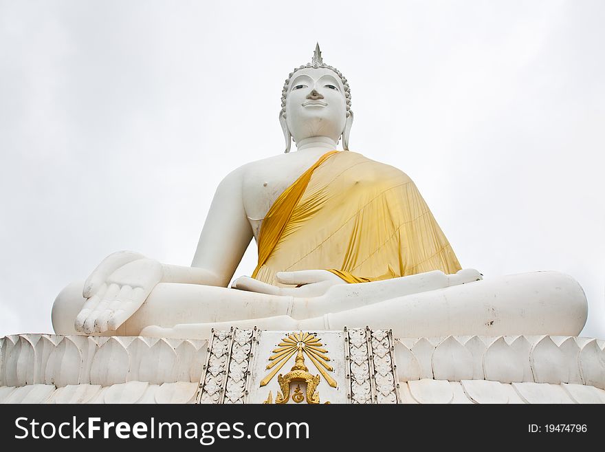White Buddha on white sky background,Thailand