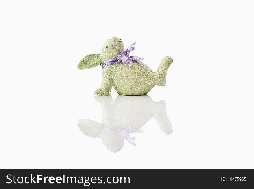 A green easter-bunny on white background