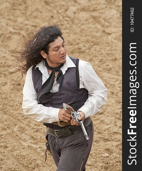 Sheriff reloading his pistol at Mini Hollywood, Almeria, Andalusia Spain