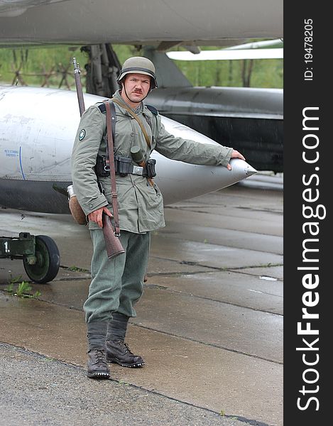 Member of Red Star history club wears historical German uniform during historical reenactment of WWII in Kiev,Ukraine. Member of Red Star history club wears historical German uniform during historical reenactment of WWII in Kiev,Ukraine