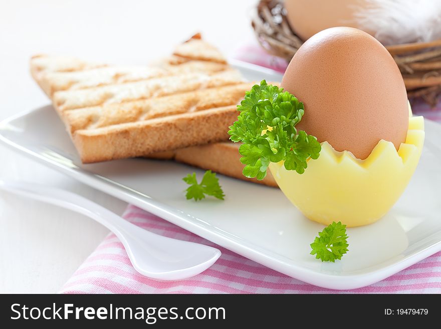 Boiled egg with fresh toast