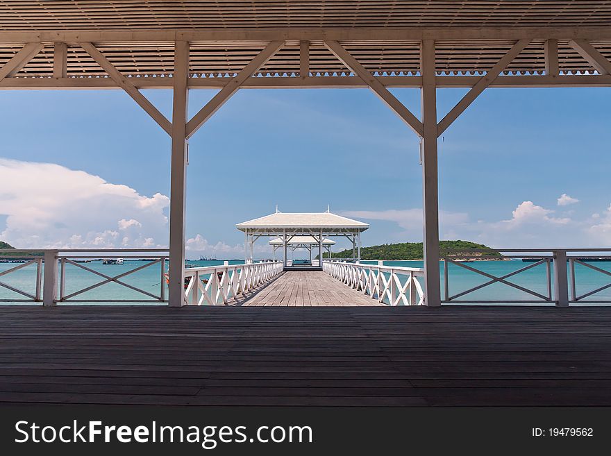 White bridge in to the sea with beautiful blue sky from the inside. White bridge in to the sea with beautiful blue sky from the inside