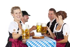 Bavarian Men And Women Toast With Oktoberfest Beer Stock Photo Bavarian Men And Women Toast With Oktoberfest Beer Stock Photo