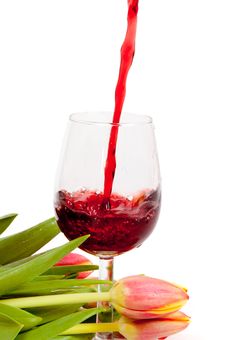 Red Wine Pouring Into Wine Glass Stock Photography