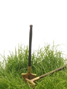 Green Grass With Garden Tools Stock Photos
