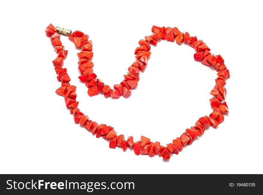 A single necklace over a white background