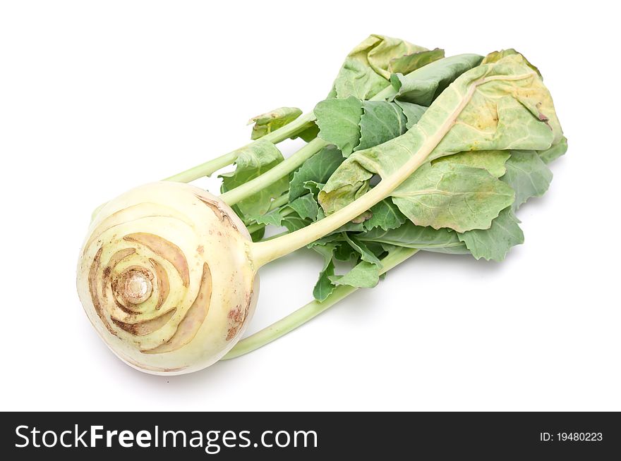 A single fresh kohlrabi over white background