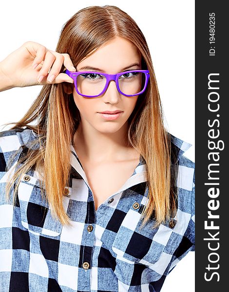 Portrait of a girl teenager in a big pink glasses. Isolated over white background. Portrait of a girl teenager in a big pink glasses. Isolated over white background.