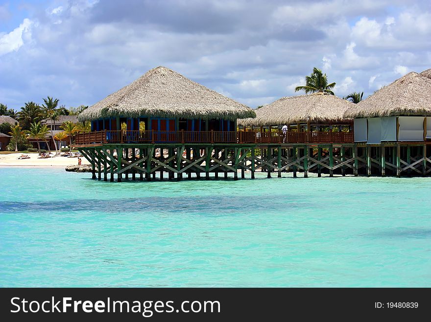 Turquoise ocean and luxury terraces on tropical coastline. Turquoise ocean and luxury terraces on tropical coastline