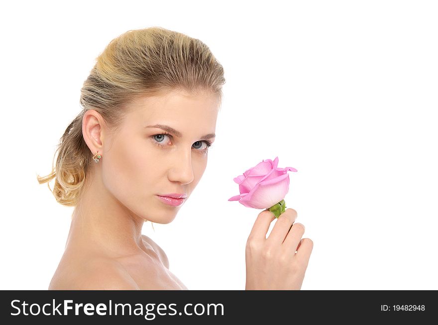 Beautiful blonde with pink rose isolated on white