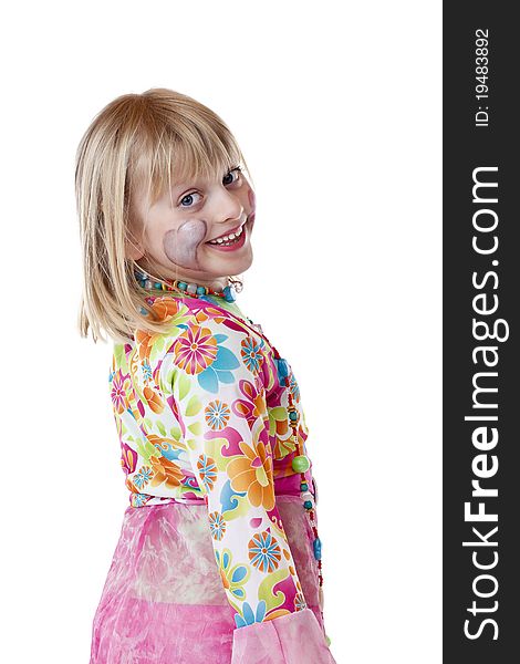 Young blond girl in carnival costume smiles