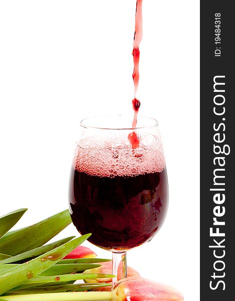 Red wine pouring into wine glass background