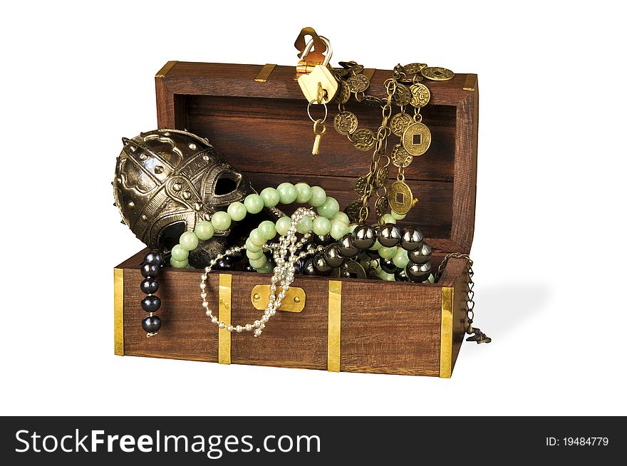 Decorative casket with costume jewellery on the white isolated background