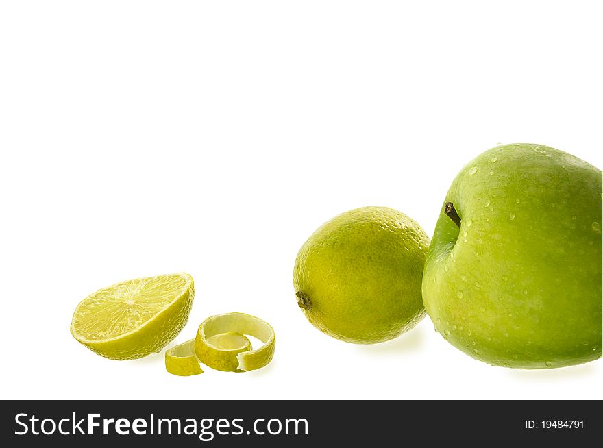 Apples and lemons on the white isolated background