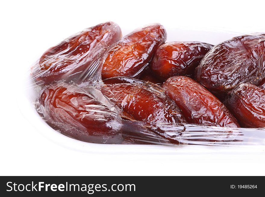 Dried date fruits isolated on white background
