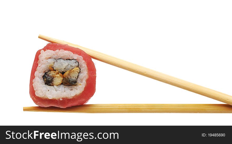 Sushi with chopsticks isolated on a white background