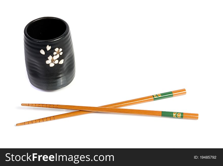 Chopsticks and tea bowl-Japanese kitchen utensil on white background. Chopsticks and tea bowl-Japanese kitchen utensil on white background