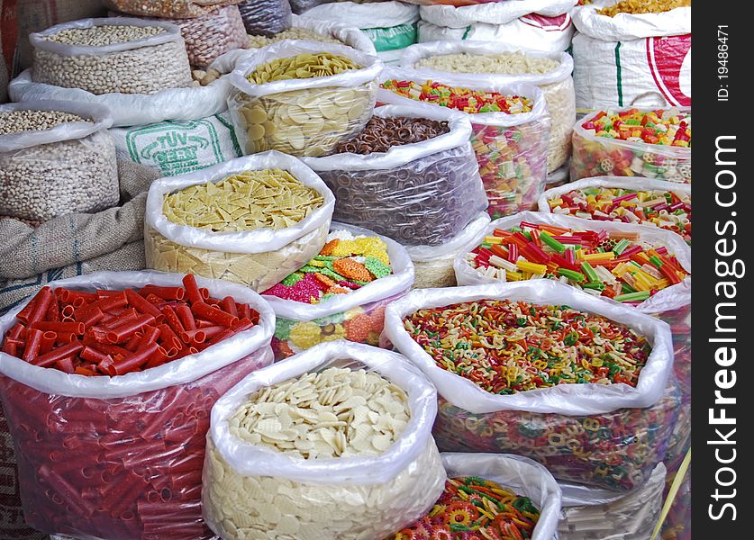 Colorful, spices, pulses and pasta on display in an Indian market. Colorful, spices, pulses and pasta on display in an Indian market