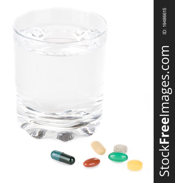 Pills with glas of water