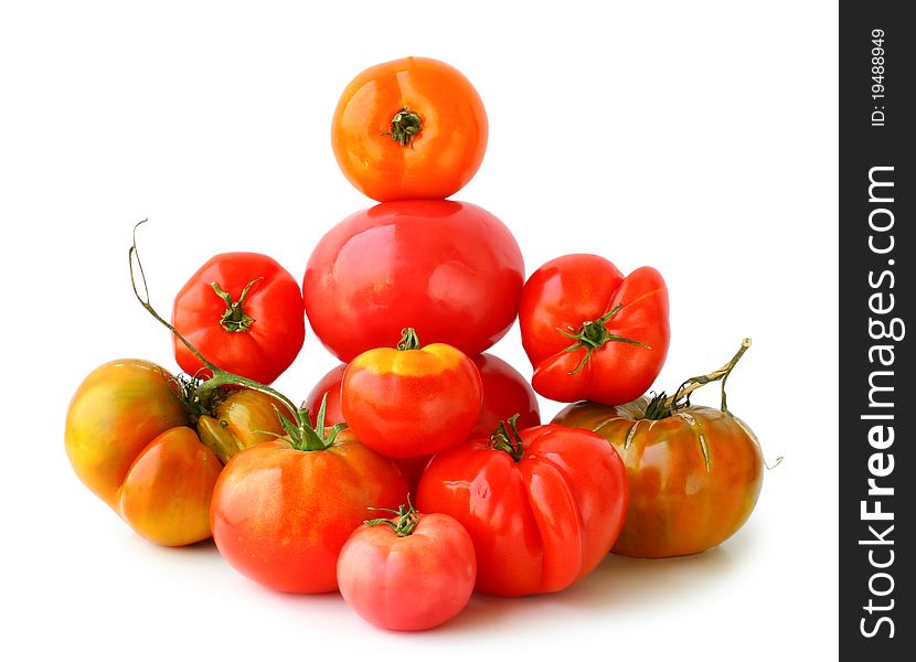 Different fresh tomatoes on the white background