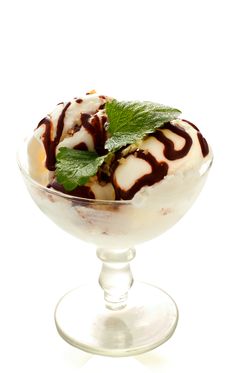 Ice Cream With Nuts And Chocolate Topping Stock Photography