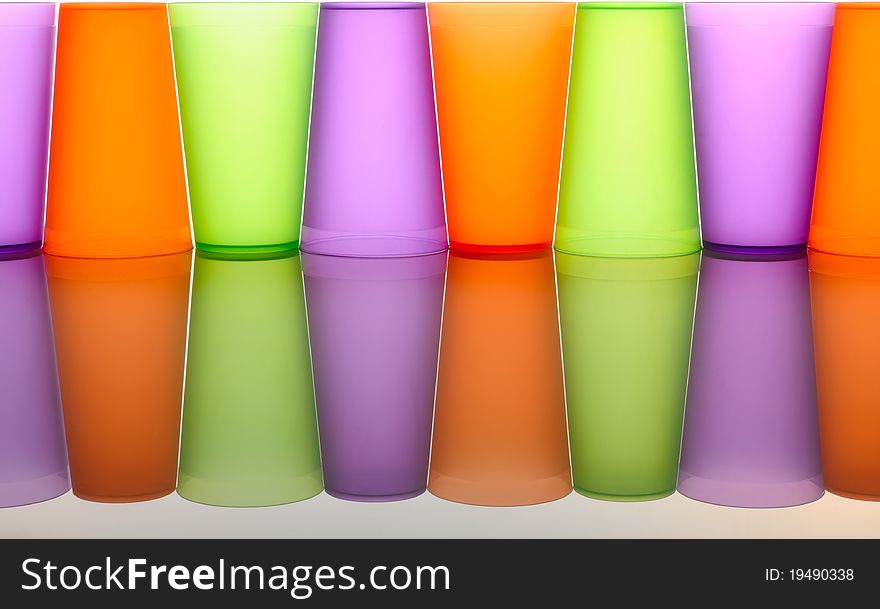 Abstract background of colored glasses of frosted plastic