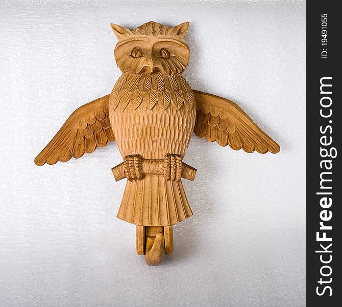 Wooden toy - hanger in the form of an owl. Wooden toy - hanger in the form of an owl