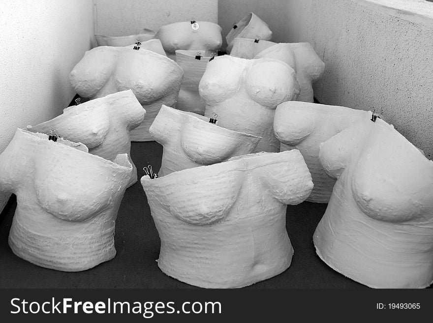 Several molds of the female torso. Several molds of the female torso