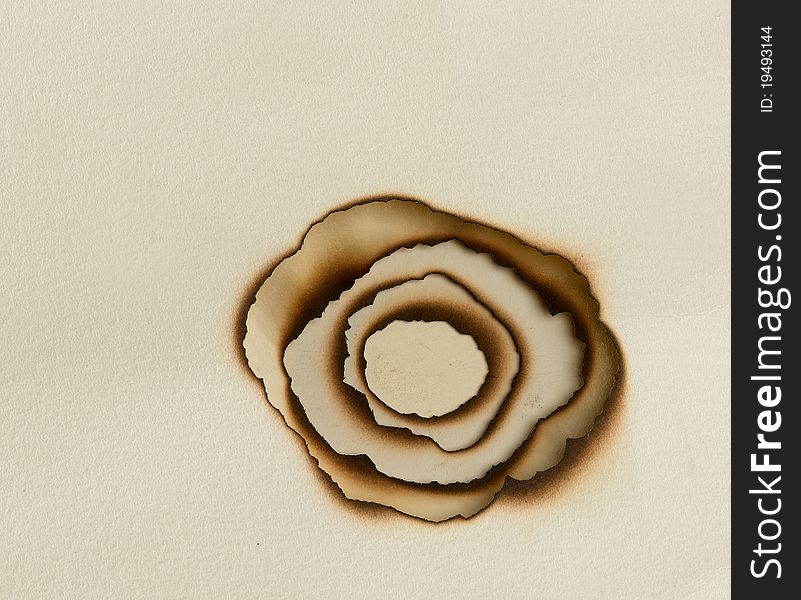 A close up of burned paper