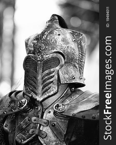 Non-Identifiable individual dressed in armor in a Renaissance festrival. Non-Identifiable individual dressed in armor in a Renaissance festrival.