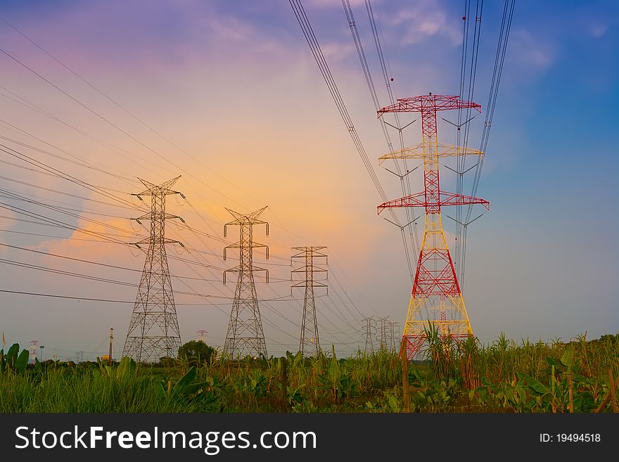 Electricity pylons at tropical sunset. Electricity pylons at tropical sunset