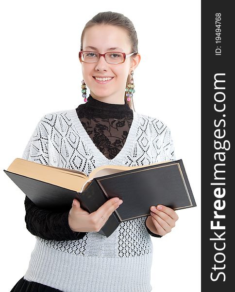 Girl with glasses reading a thick book. Isolated on white background