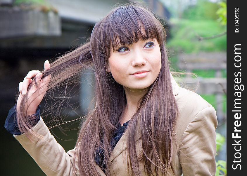 Face of the young beautiful woman outdoors. Face of the young beautiful woman outdoors