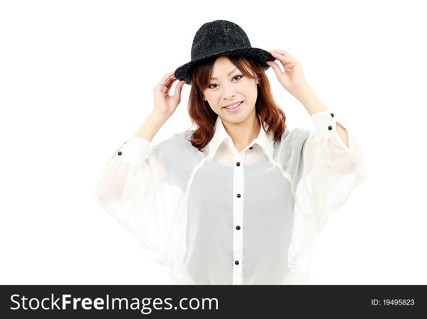 Portrait of young woman with a hat