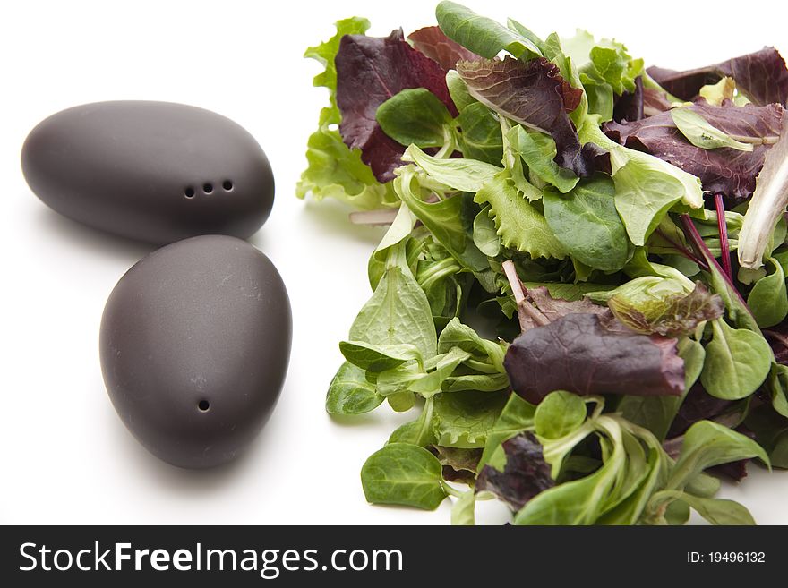 Salt shakers and pepper shakers with lettuce leaves