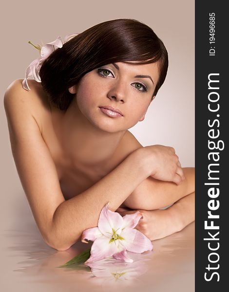 Young Girl Brunette And   Flowers In Her Hair