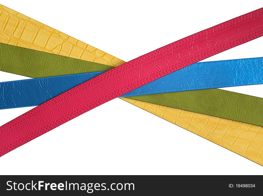 Few crossed coloured belts isolated on white background with clipping path