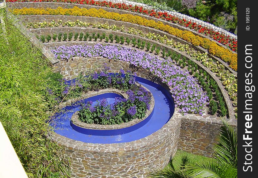 Walled flower bed built into hillside garden.south facing or improved sunlight. Walled flower bed built into hillside garden.south facing or improved sunlight.