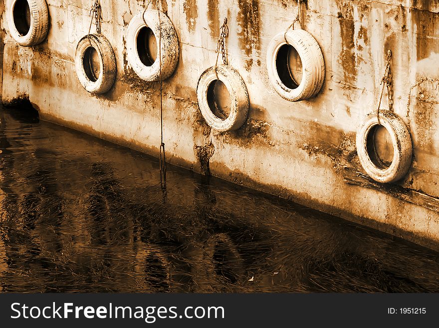 Some old tires in a dock