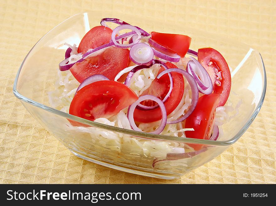 Salad From Fresh Cabbage, Tomatoes And Onions