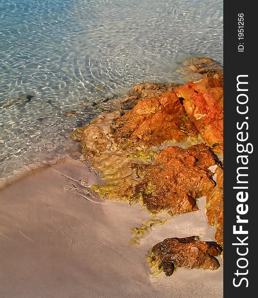 The crystal-clear water in a beach in Italy (Sardinia)