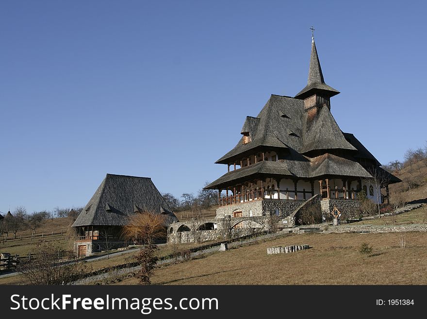 Wooden buildings on a ortodox monastery and the monastery park. Wooden buildings on a ortodox monastery and the monastery park