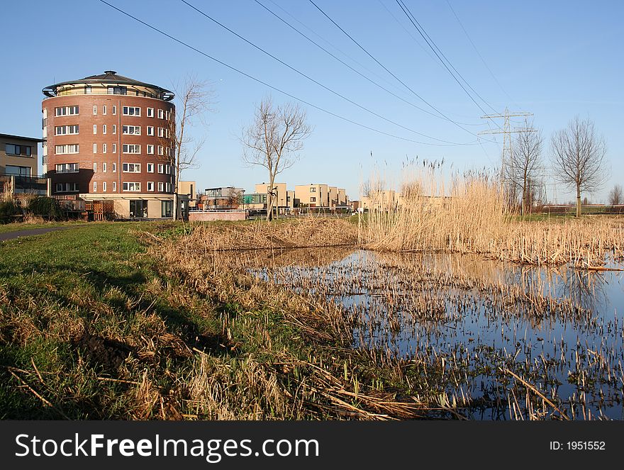 Suburb and power lines encroaching upon nature. Suburb and power lines encroaching upon nature