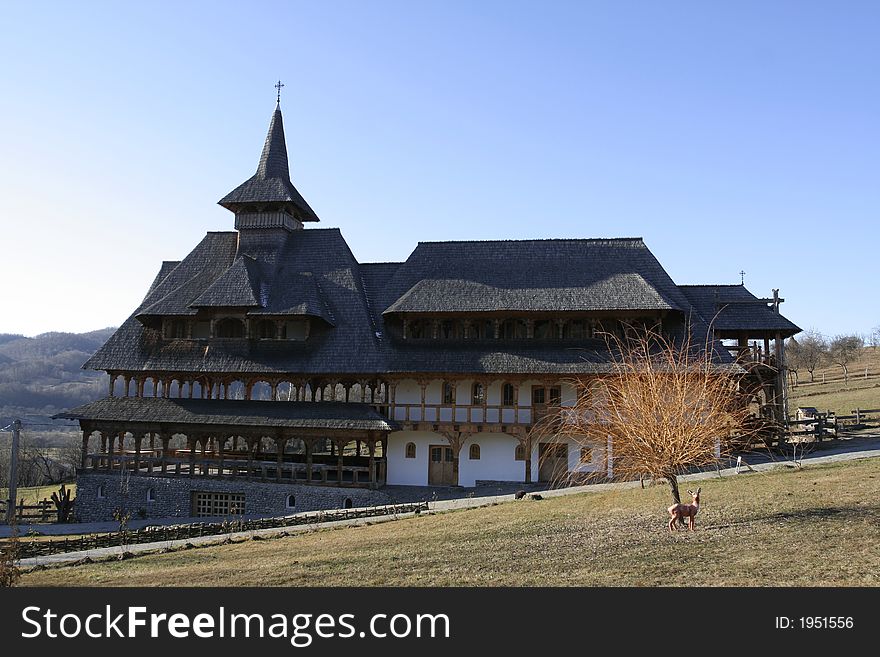 Wooden buildings on a ortodox monastery and the monastery park. Wooden buildings on a ortodox monastery and the monastery park