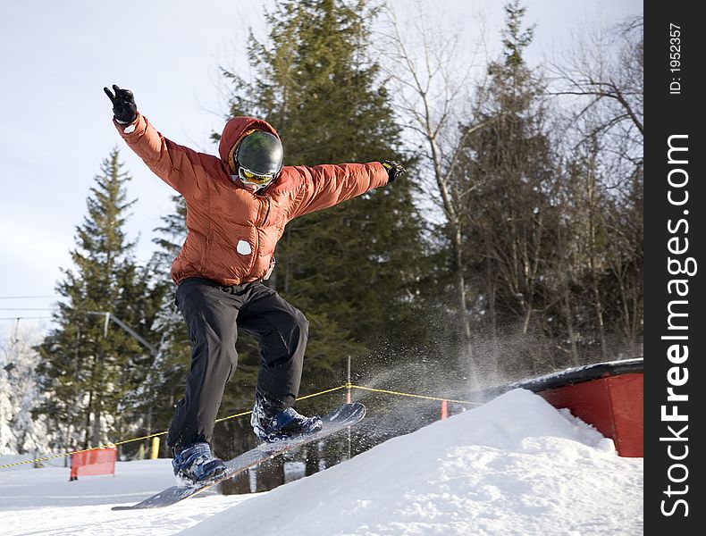 Kid flying on the snowboard. Kid flying on the snowboard