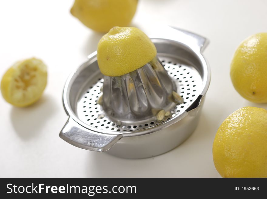 Lemon squeezer with some lemons