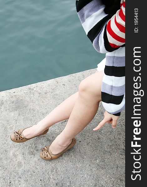Different colored stripes worn by young girl. Different colored stripes worn by young girl