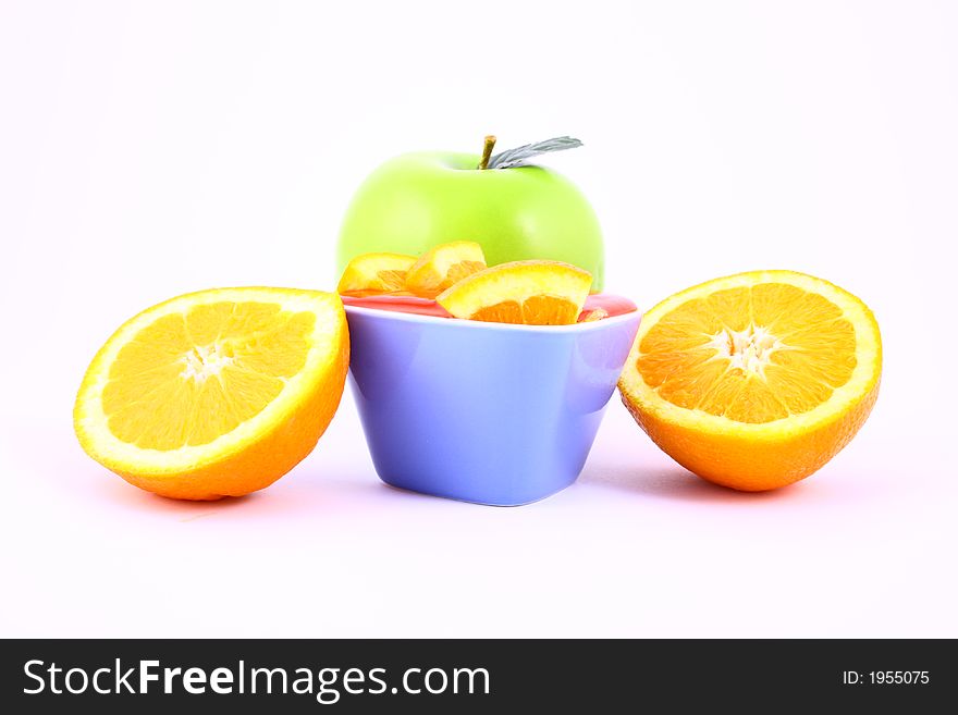 Orange Jelly in a white bowl with silverware. Orange Jelly in a white bowl with silverware.